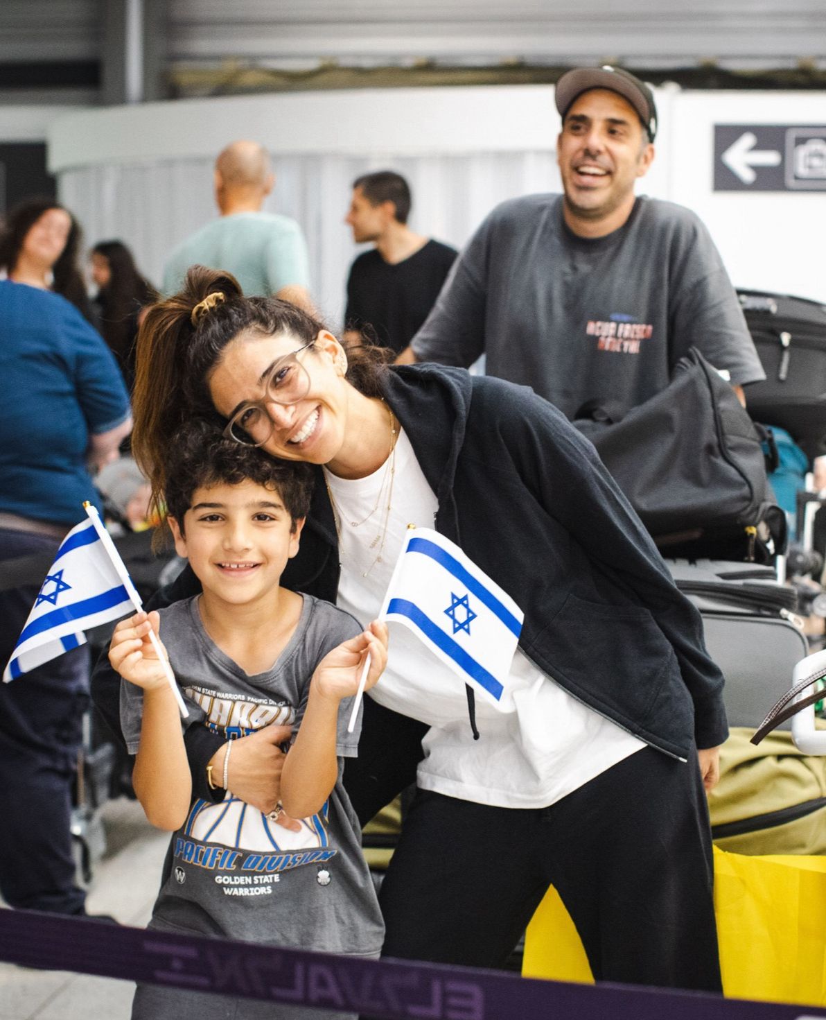 British olim arriving with flags at the airport